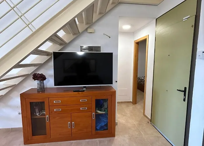 Montana Roja Patios El Médano